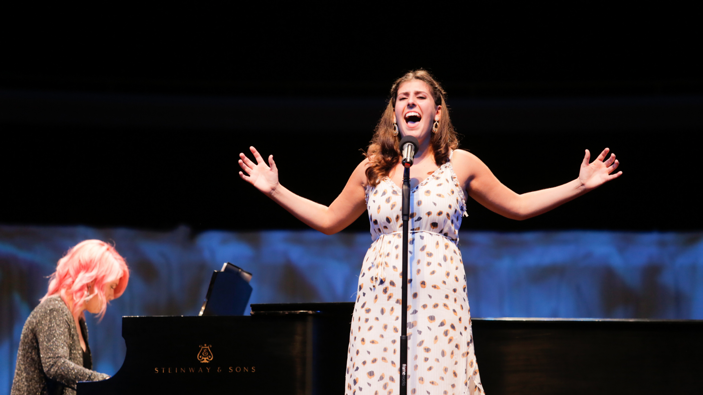 Corinne Ferrer performing on the Palladium stage in Carmel, Indiana.