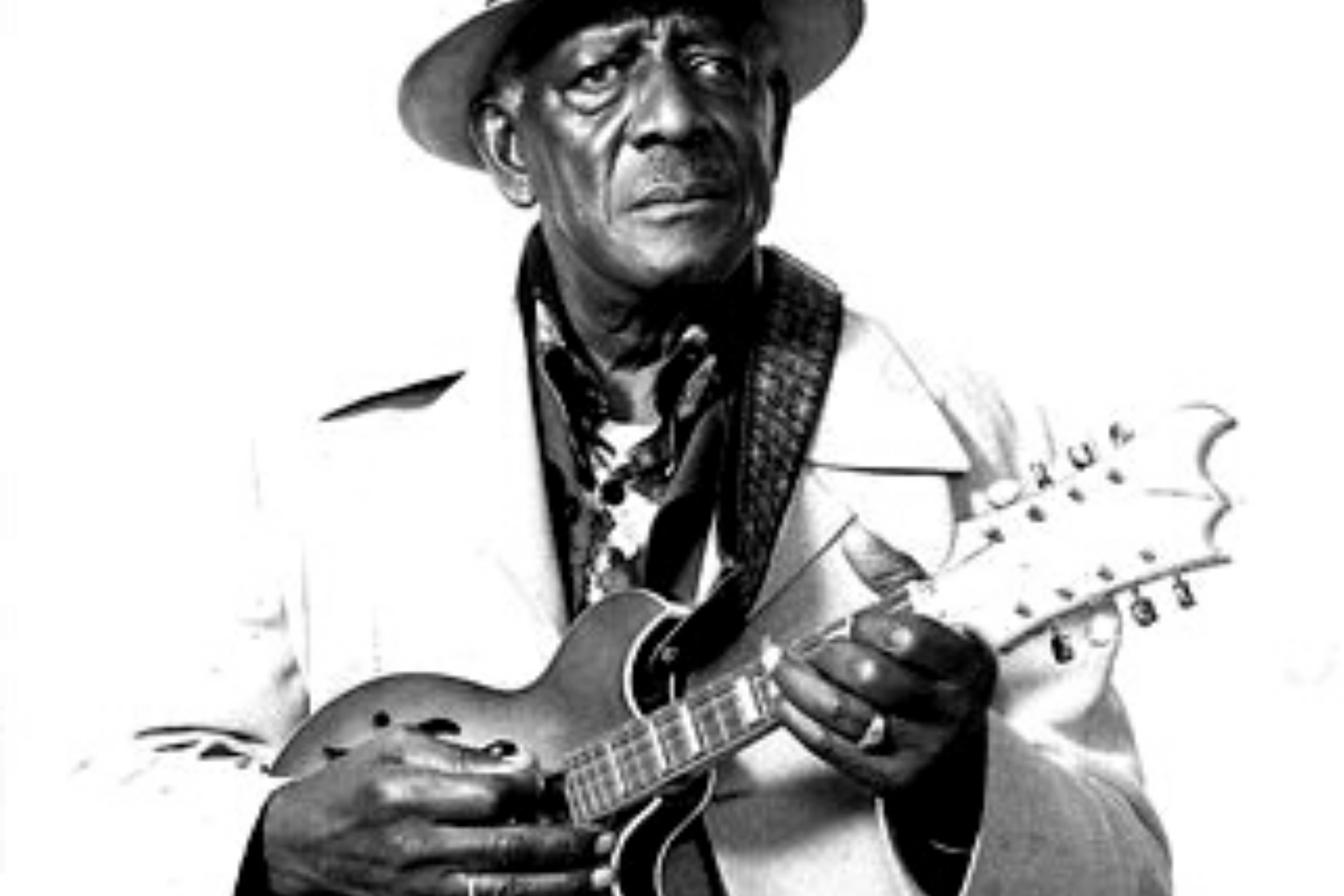 Yank Rachell poses with his mandolin and a contemplative look.